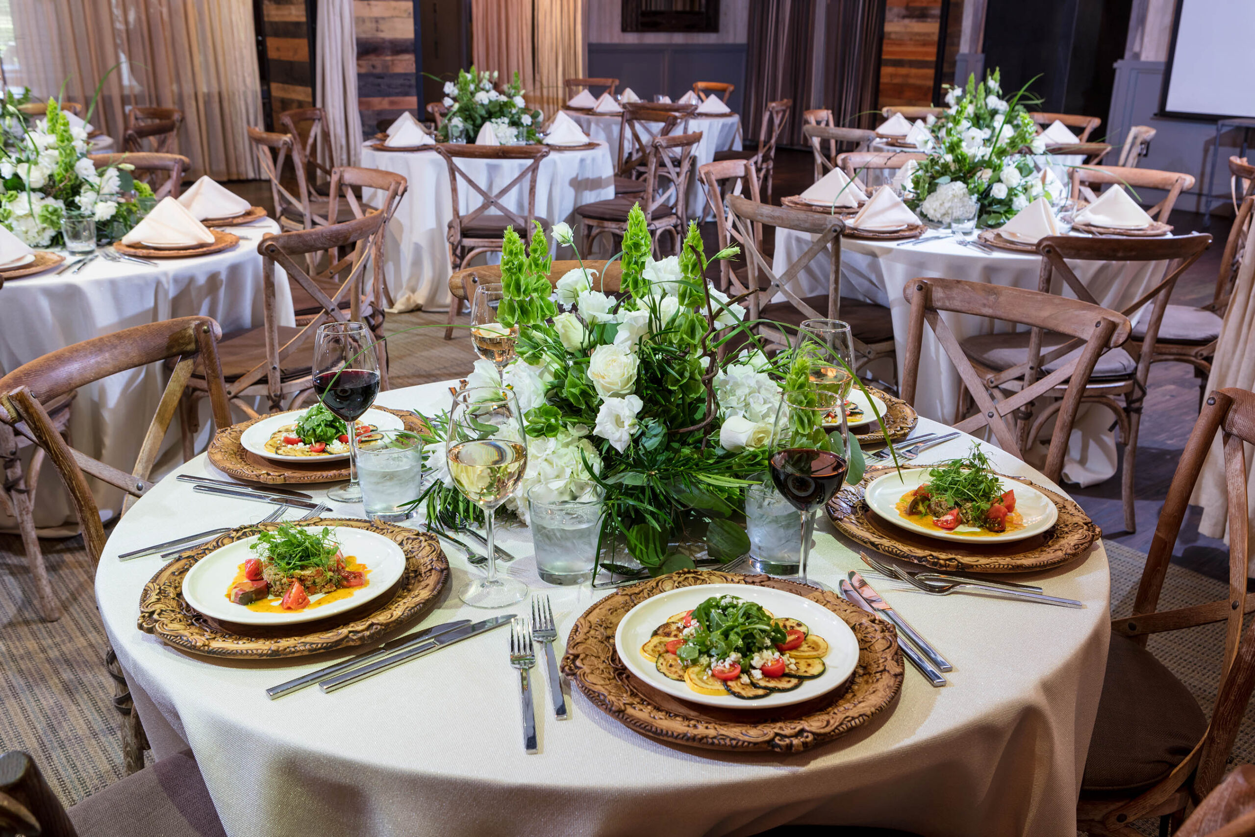 Farmers Table Private Oak Room Table Setup sith variety of dishes